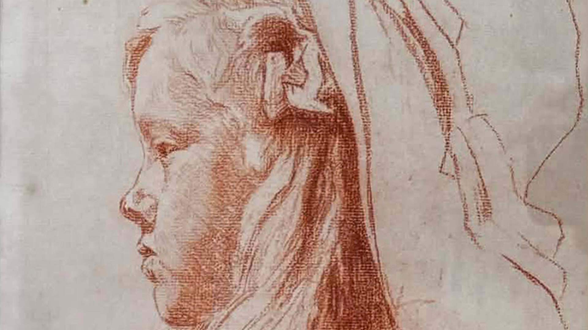 Red chalk drawing of a woman's profile with flowing hair