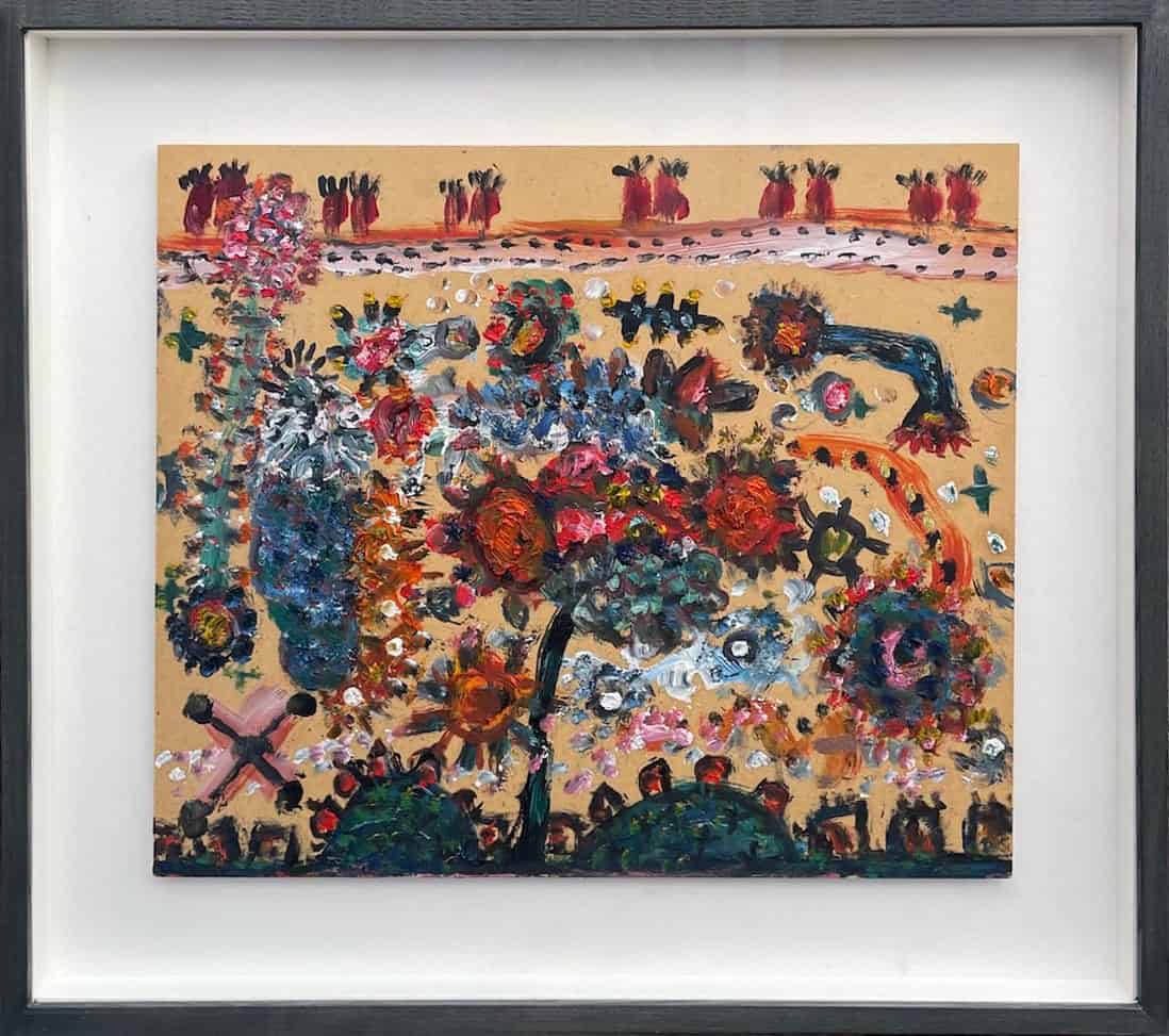 Vibrant abstract painting with figures and floral motifs in frame